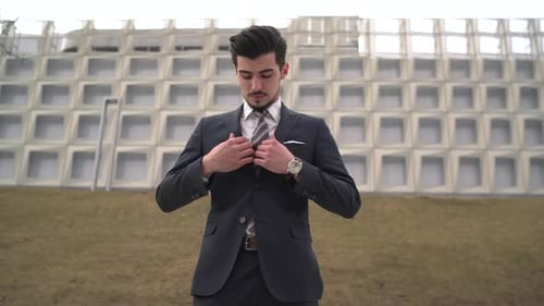 Businessman standing outside the office