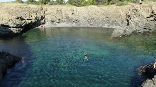 Swimming in an Unspoiled Mediterranean Seaside Beach
