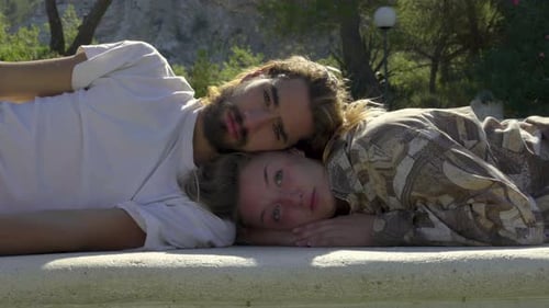 Affectionate Couple Relaxing Outdoors in Tropical Nature