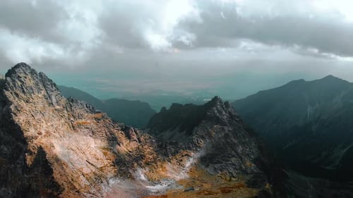 AERIAL Mountain Summit Panorama, beautiful view over mountain tops with epic landscape