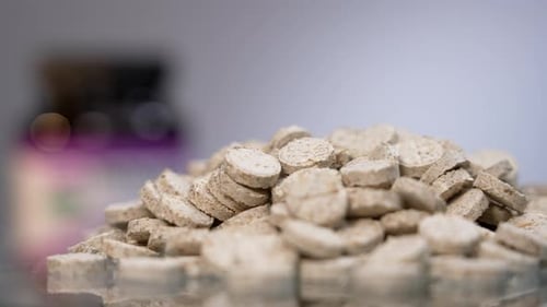 Flat Round Pills Rotate Close Up