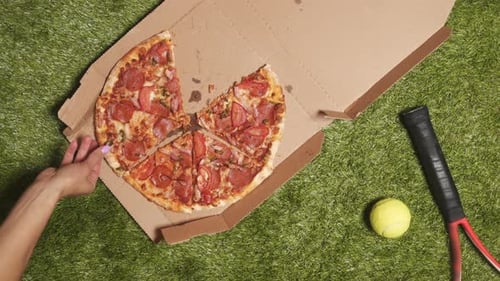 Pizza and Tennis on Artificial Grass