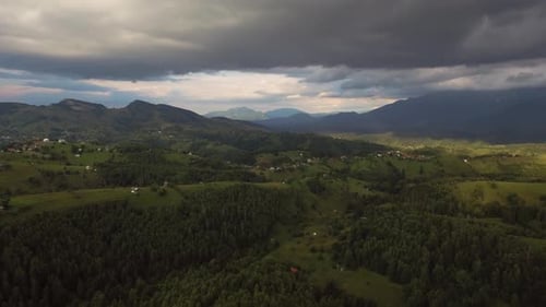 Flying Above Houses on top of the Mountain