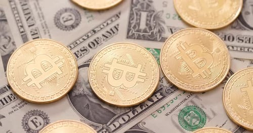 Golden Bitcoins on United States One Dollar Bills