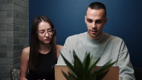 Male Professional Mentor Helping Female Client Teach Intern Training New Worker Consult Customer