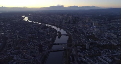 Establishing Shot Above All of Frankfurt Am Main, Germany Skyline High in the Air at Dusk