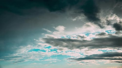 Dramatic Time-Lapse of Colorful Clouds at Sunset