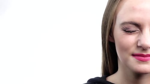 Female Young Adult with Makeup Smiling, Close Up