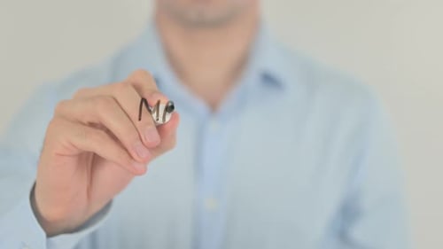 Man Writes "Make It Work" On Clear Surface