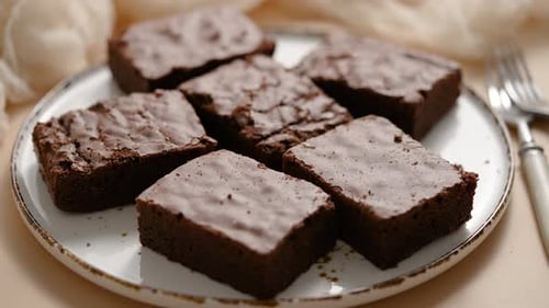 Plate of Delicious Chocolate Brownies with Fork