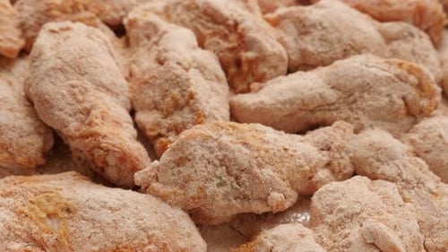 Raw chicken meat arranged and ready to being baked close-up 4K 2160p 30fps UltraHD tilting footage -