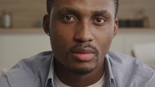 Close Up of Handsome Young Adult in Blue Shirt
