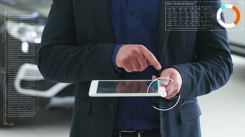 Concept of the Visual Future. A Man Shows on the Tablet a EURO Sign and Futuristic Elements.