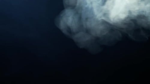 Swirling White Smoke on a Dark Background
