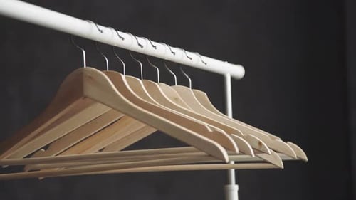 Minimal Row of Wooden Clothes Hangers