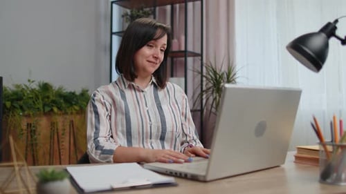 Young Woman Freelancer at Home Office Making Laptop Video Call Chat Conversation Working Online