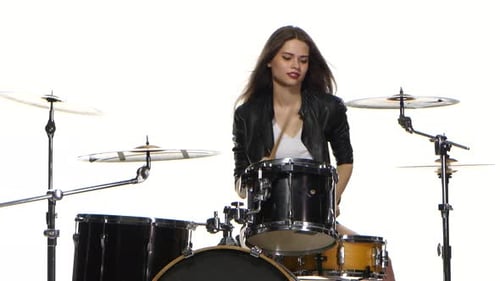 Young Woman Drummer Playing Drums on White Background
