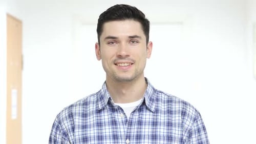 Yes By Handsome Man in Office Shaking Head to Agree