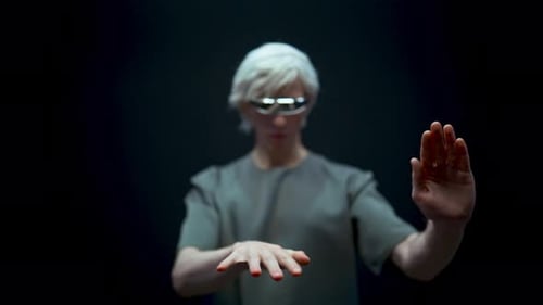 Man Interacts With Futuristic Touch Screen Technology