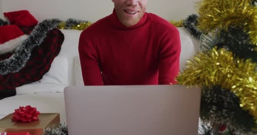 Man Video Chatting at Home During Christmas Holiday