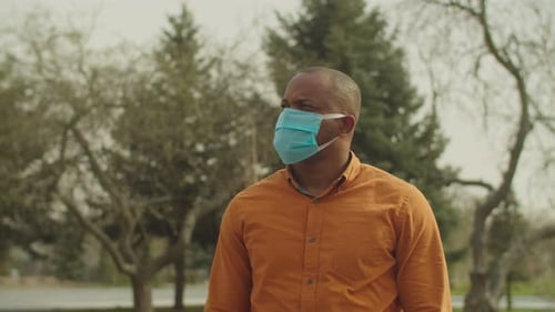 Adult Man Wearing Face Mask Outdoors