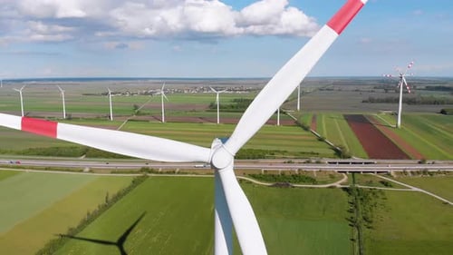 Aerial View of Wind Turbines Farm and Agricultural Fields