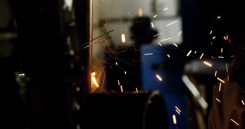 Welder welding a metal