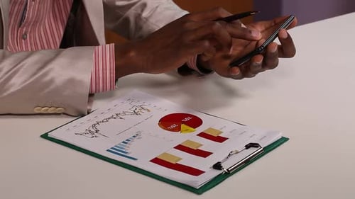 Reviewing Data with a Phone and Report