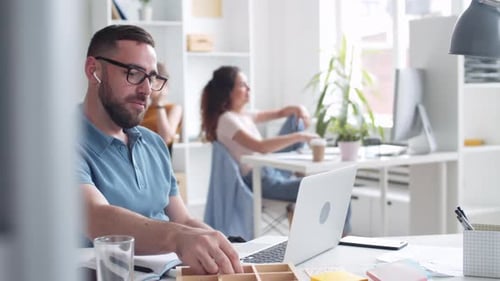 Man Discussing Business in Bright Modern Office