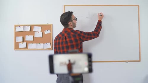 Bulgarian Maths Teacher During an Online Class, Talking To the Camera in Live Stream