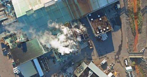 Aerial Panoramic View of Tanks for Chemical Mixing Industrial Plant with Chemical Industry System