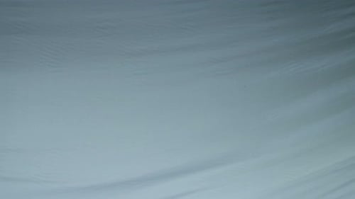 Light Blue Fabric Rippling in a Close Up Shot