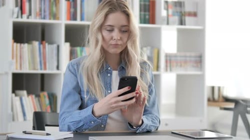Young Woman Using Smartphone