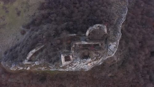 Flying Above Medieval Fortress Ruins, Aerial View of a Stronghold