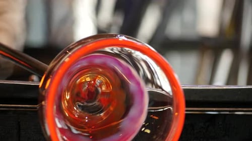 Glass Blower Forming Molten Glass Art