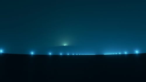 Extraterrestrial spacecraft (UFO) landing on a strip during a foggy night. 4KHD