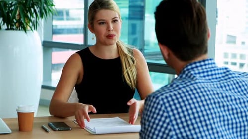 Business Meeting in a Modern Office
