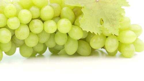 Close Up of Juicy Green Grapes on White