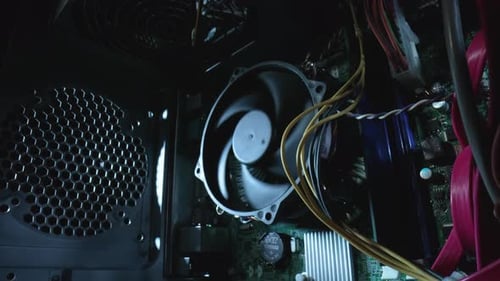 Computer Fan Rotating in Dark Interior