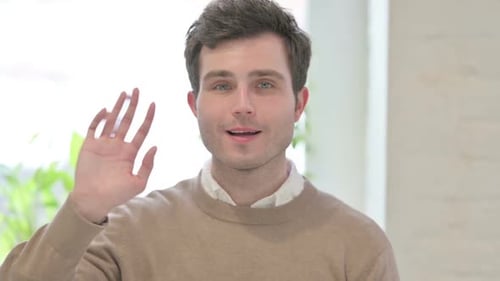 Portrait of Man Waving Welcoming