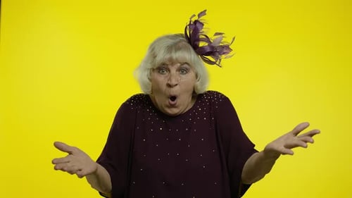 Senior Woman Reacts with Big Expression