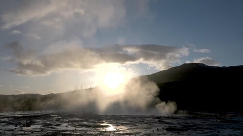 Environment. Iceland. Geyser in famous tourist attraction. Steam from fumarole in geothermal area.