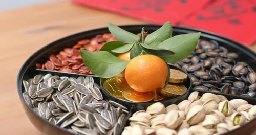 Festive Tray of Snacks with Fruit and Coins
