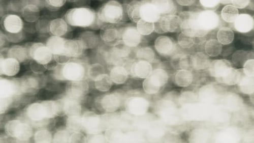 Abstract Bokeh Background of Sunlight Reflected off Ocean