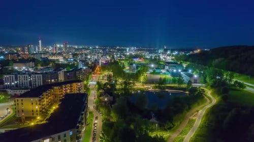 Night view of the city from the air time lapse