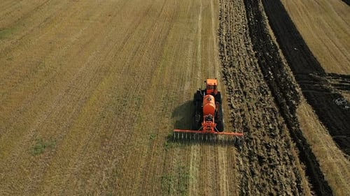 Tractor Cultivating Field from Above