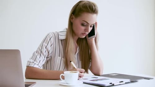 Blonde Business Woman Working at Modern Office