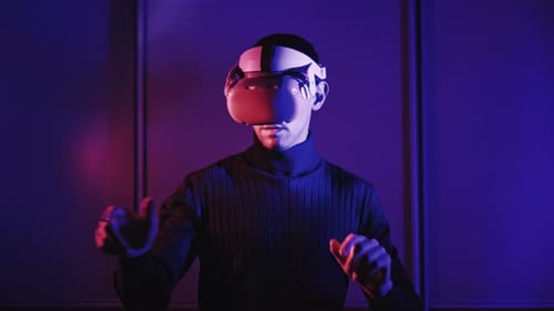 Man Immersed in Virtual Reality with VR Headset