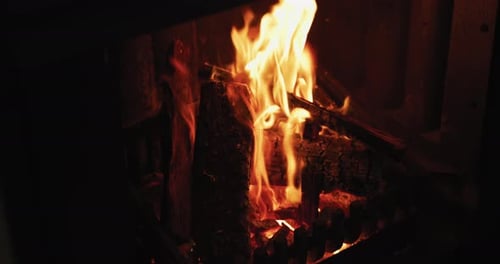 Fire burning in a fireplace 4k
