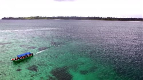 Tropical Watersports Fun with Boat and Snorkelers